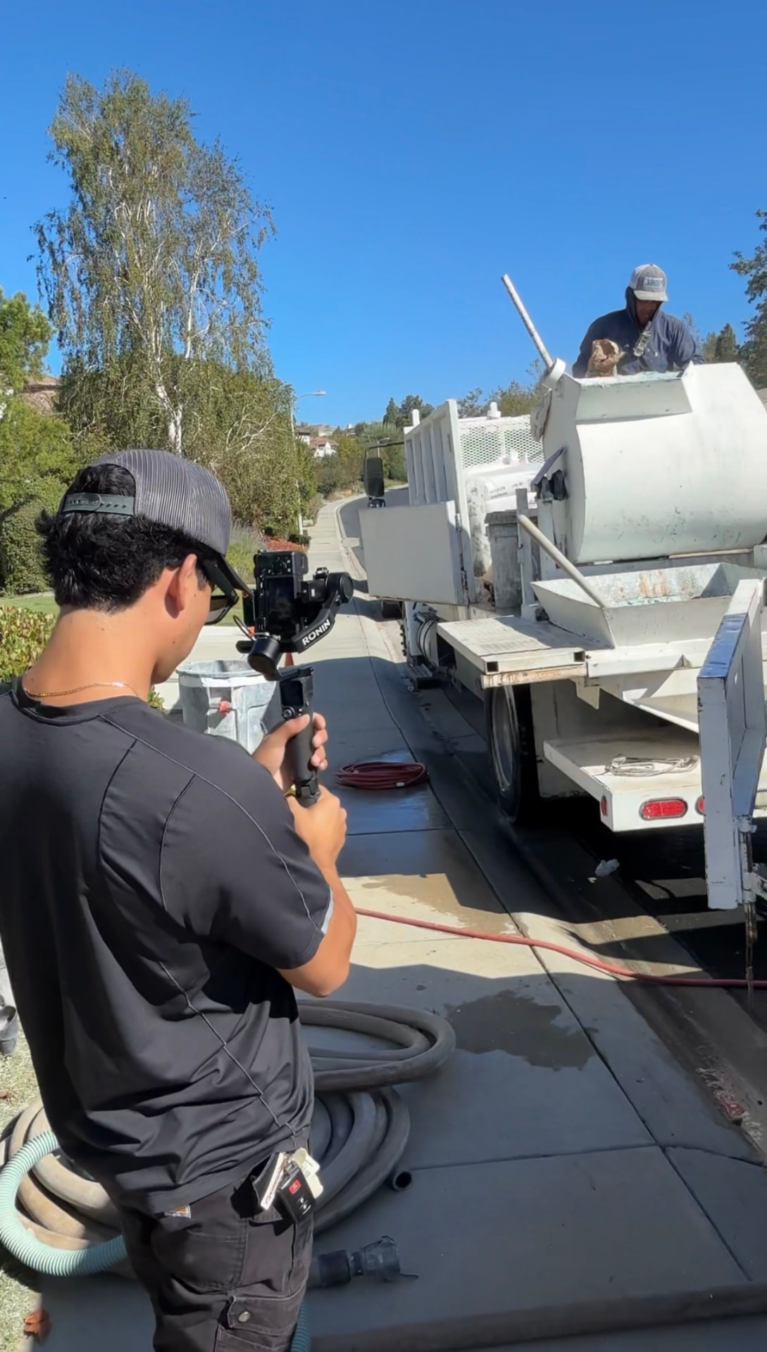 Clicker Media filming a concrete pour on a Southern California driveway